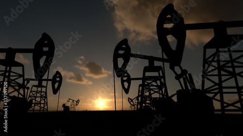 The silhouette of oil pumps in a large oil field at sunrise. 3d rendering. 3d illustration