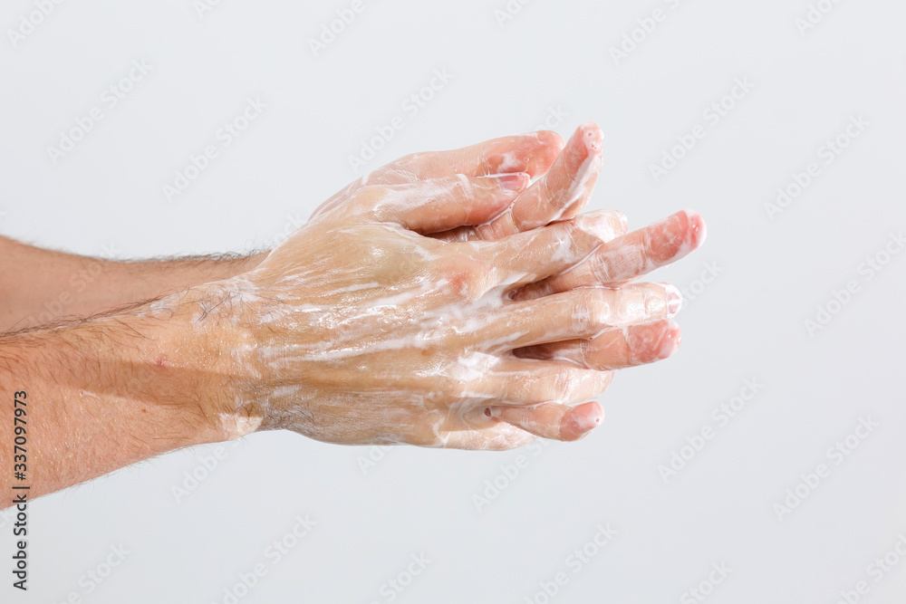 man washing hands isolated over white background man washing hands isolated over white background