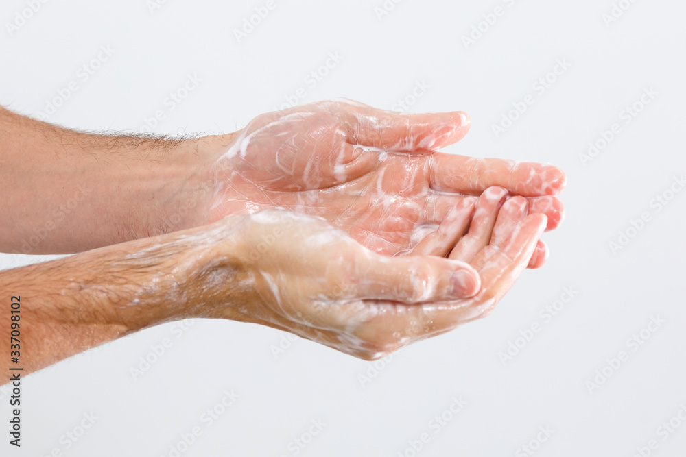 man washing hands isolated over white background