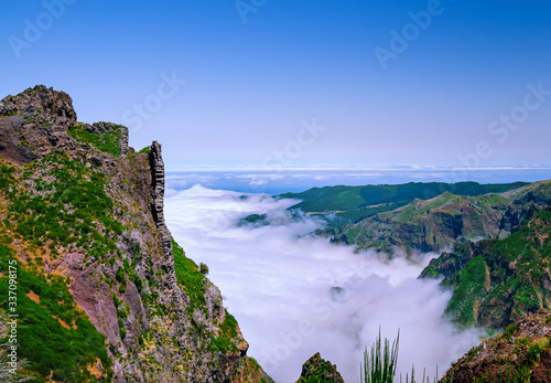Madeira landscape with canyon covered by clouds