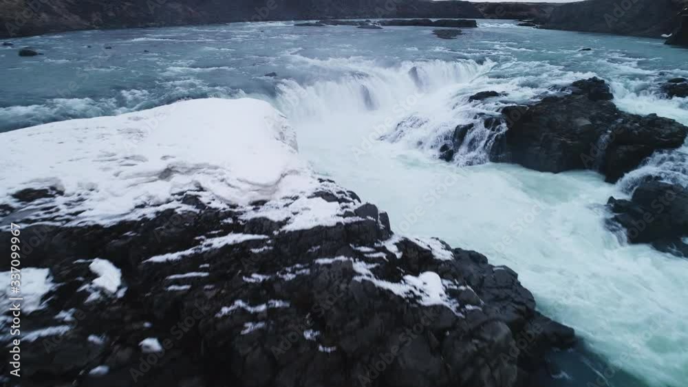 Aerial, river rapids in Iceland on overcast day Aerial, river rapids in Iceland on overcast day