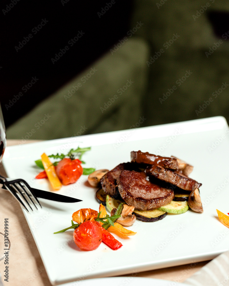 lamb steak pieces with roasted vegetables