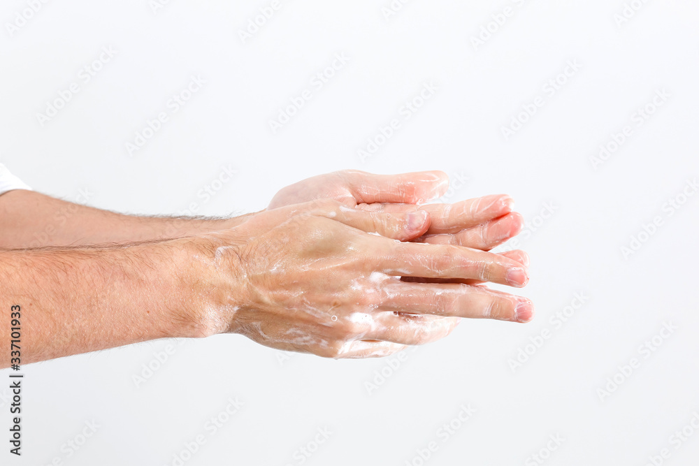 Close up image of washing hand against white background Close up image of washing hand against white background