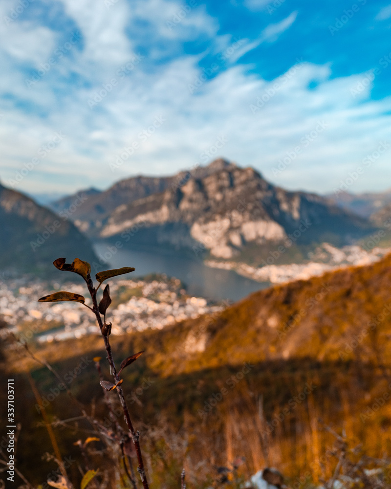 Sunset view from Monte Barro,Relaxing on top of a small mountain with lake and clouds Oct-27-2019 Sunset view from Monte Barro,Relaxing on top of a small mountain with lake and clouds Oct-27-2019