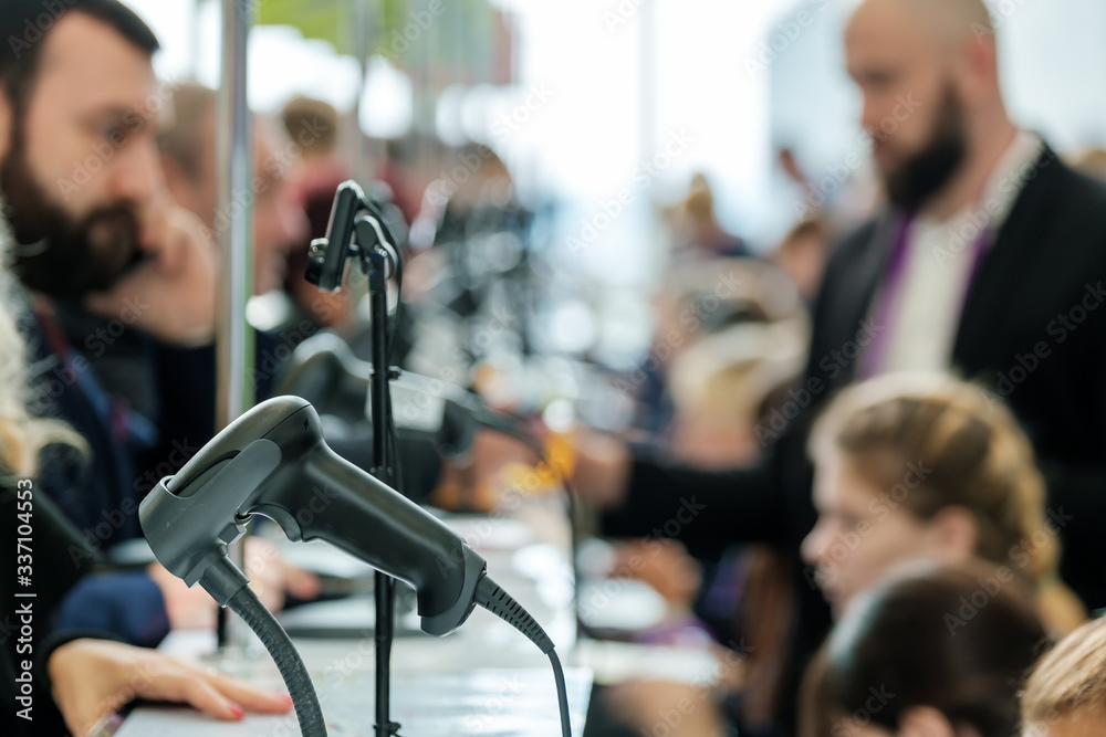 Business forum visitors register at the front desk