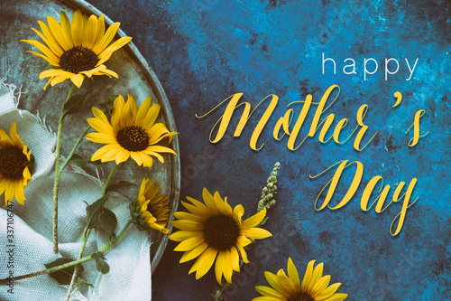 Mothers day sunflowers on blue vintage texture background for holiday graphic.