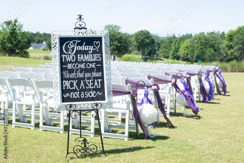 Chalk board Wedding ceremony sign in white frame that reads 