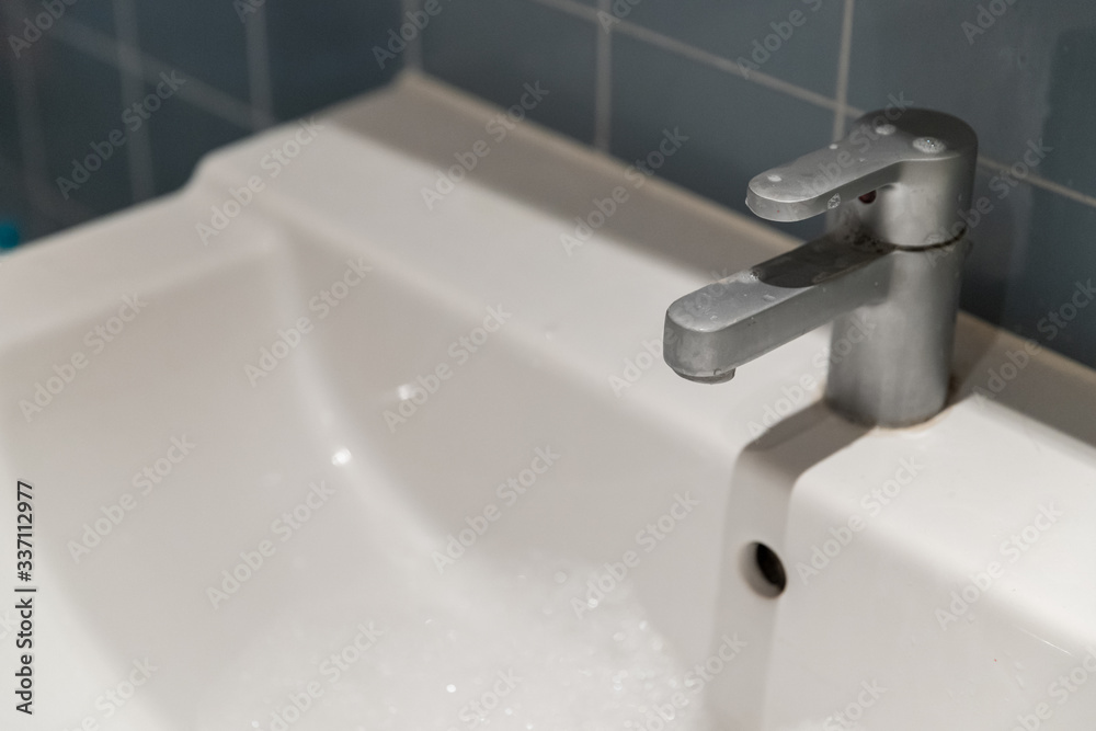 close-up tap or faucet in bathroom, no water close-up tap or faucet in bathroom, no water