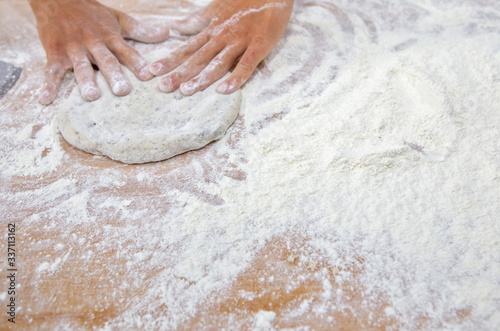 Baker molding wholemeal flour breads for baking