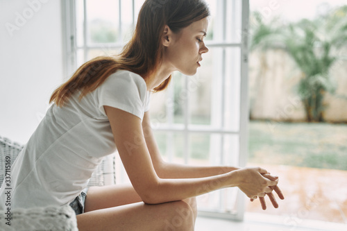 Free Download young woman looking out window - GFXLoad