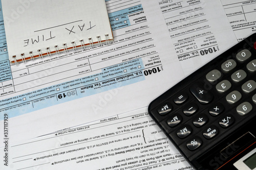 Tax forms 1040. U.S Individual Income Tax Return. Tax time. © Leonid