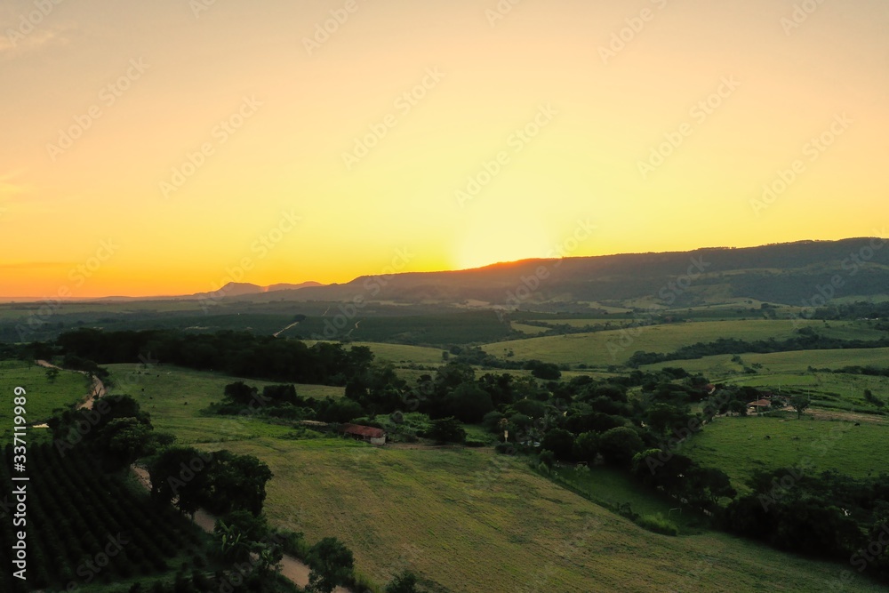 Aerial view of sunset in the rural life scene. Great landscape.