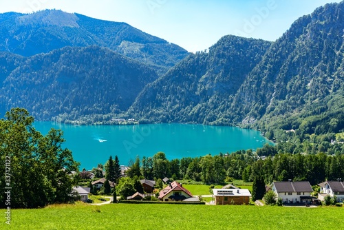 Beautiful amazing countryside view on Attersee lake im Salzkammergut, alps mountains in from  Unterach. Upper Austria, nearby Salzburg. photo