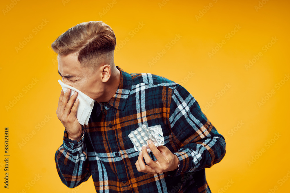young man with a glass of water young man with a glass of water