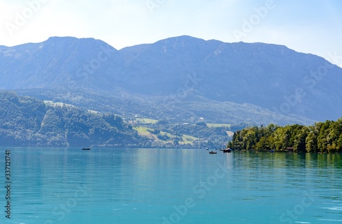 Beautiful view on Attersee lake im Salzkammergut, alps mountains, boats, sailboats, sailboat by Stockwinkl, Parschallen, nearby Nussdorf, Zell. Upper Austria, nearby Salzburg.