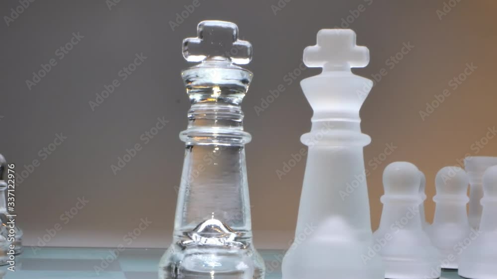 the concept of the confrontation of two powers, glass chess, two kings stand opposite the concept of the confrontation of two powers, glass chess, two kings stand opposite