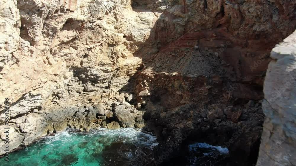 Aerial view of the coast of Majorca with crystal clear Waters on the beach. Concept of the travel, holiday,vacation, summer beach and relax Aerial view of the coast of Majorca with crystal clear Waters on the beach. Concept of the travel, holiday,vacation, summer beach and relax