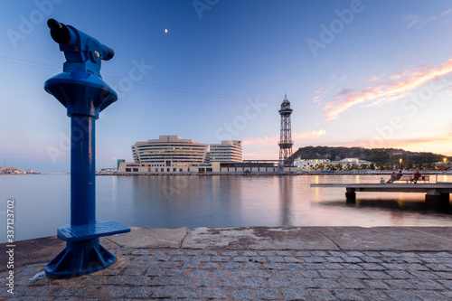 Barcelona, Spain. August, 2018: Looking at the World Trade Center Barcelona from the pier, to the financial center where is located the Eurostars Grand Marina Hotel in a sunset moment.