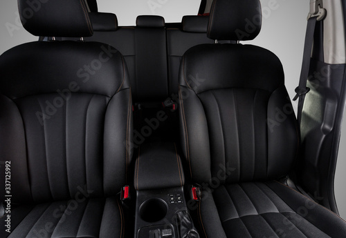 the interior of the car is covered with handmade genuine leather. The General plan of the interior of the car. View from the windshield. The back doors are cut from the photo. High-quality stitching