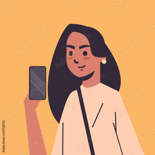 indian woman taking selfie photo on smartphone camera smiling female cartoon character portrait vector illustration