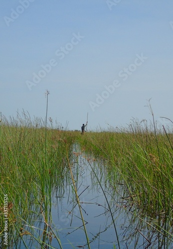 Guiding through a channel in the Okavango Delta