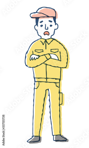 困っている表情の作業服の男性