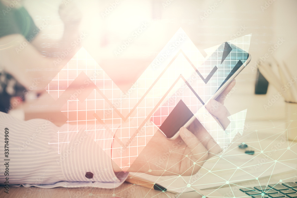 Double exposure of man's hands holding and using a digital device and arrows hologram drawing. Success concept. Double exposure of man's hands holding and using a digital device and arrows hologram drawing. Success concept.