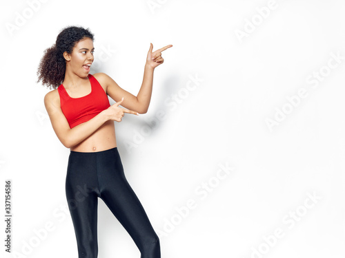 young woman pointing at something