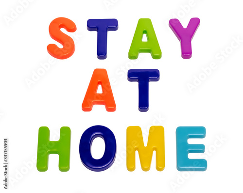 Text STAY AT HOME on a white background.