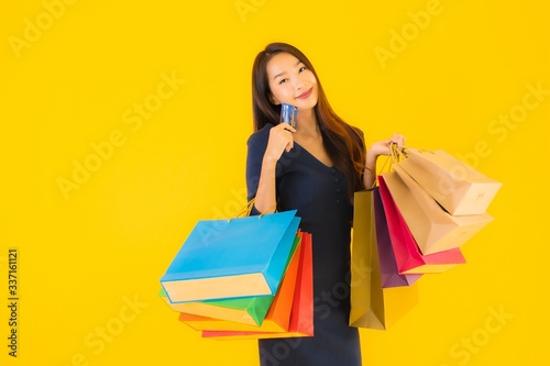 Portrait beautiful young asian woman with shopping bag