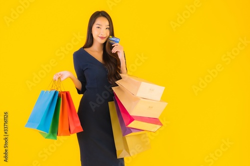 Portrait beautiful young asian woman with shopping bag