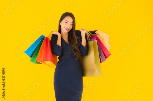 Portrait beautiful young asian woman with shopping bag