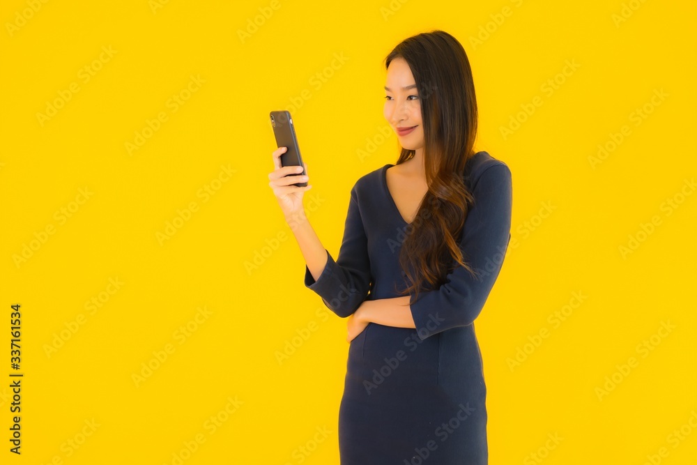 Portrait beautiful young asian woman with phone