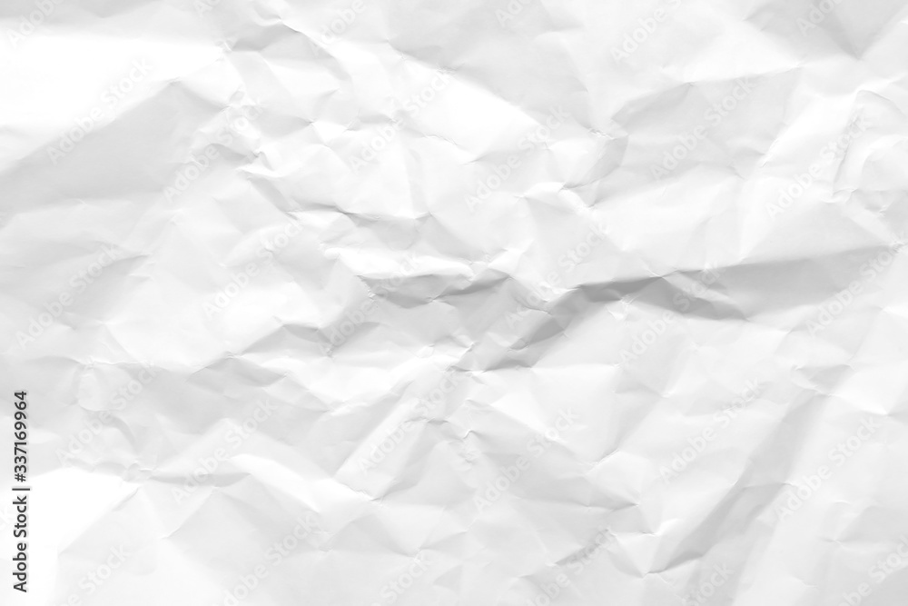 White crumpled paper texture background. Clean white paper. Top view. White crumpled paper texture background. Clean white paper. Top view.
