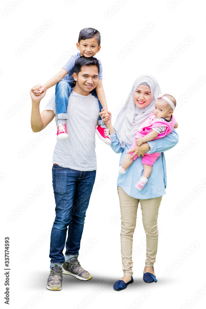 Cute children and parents standing in studio Cute children and parents standing in studio