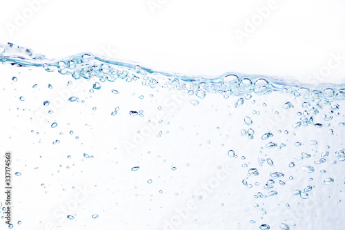 Blue bubbles underwater on white background.