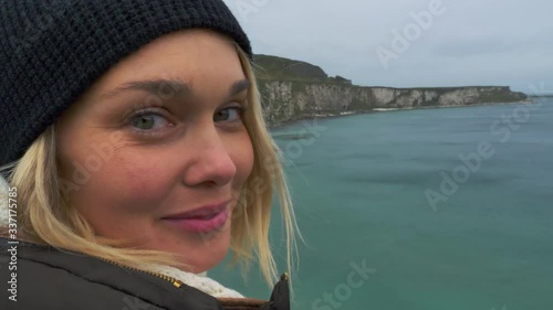 4k cinematic Slow Motion of pretty girl looking at the ocean