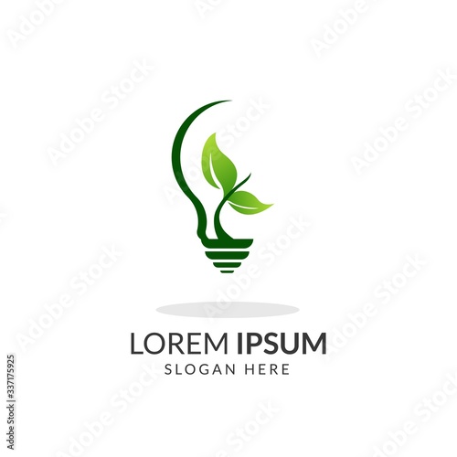 Green electric light bulb with three green leaf