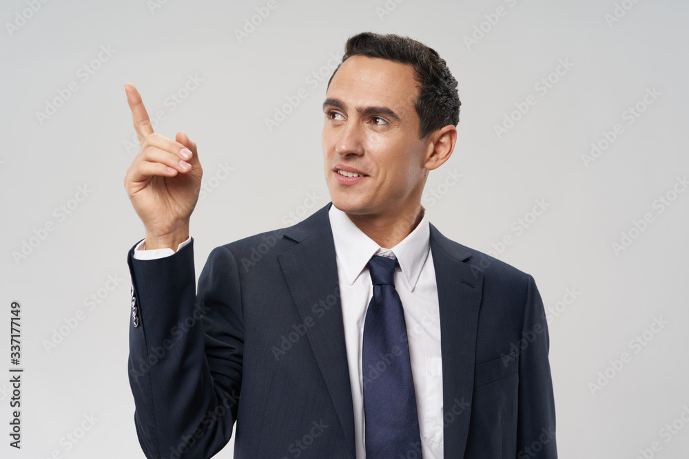 businessman pointing at something businessman pointing at something
