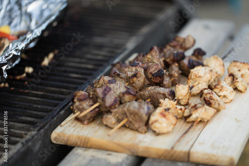 Barbecued beef and chicken skewers