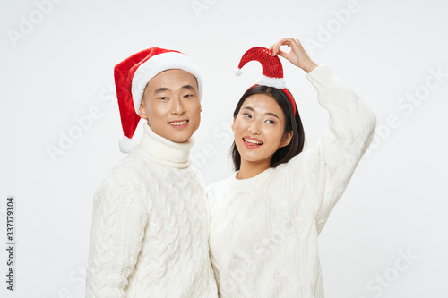 happy couple in santa hats