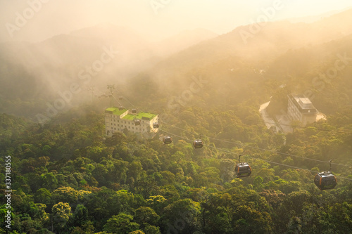 The most modern cable car system in the world at Ba Na hills, giving visitors the experience the great tour of Da Nang, Vietnam. Near Golden bridge photo