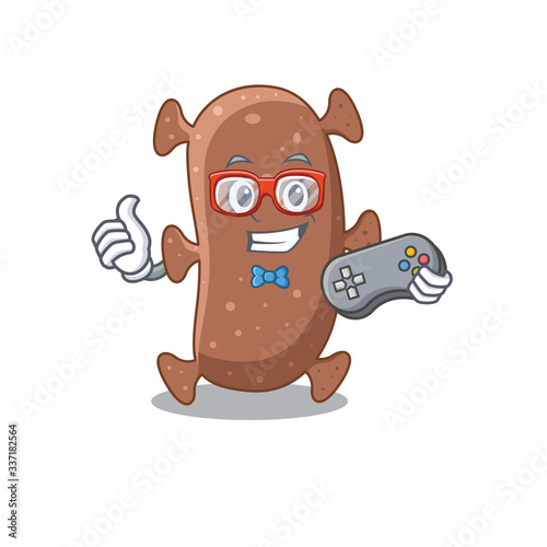Mascot design concept of actinomyces israelii gamer using controller