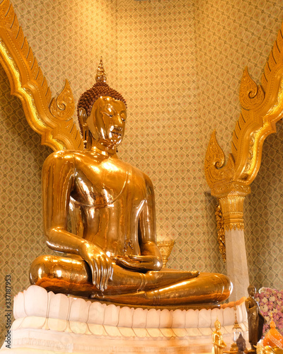 Pure Golden buddha statue in Temple of the Golden Buddha in Bangkok, Thailand
