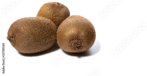 Ripe kiwi fruit on a white isolated background