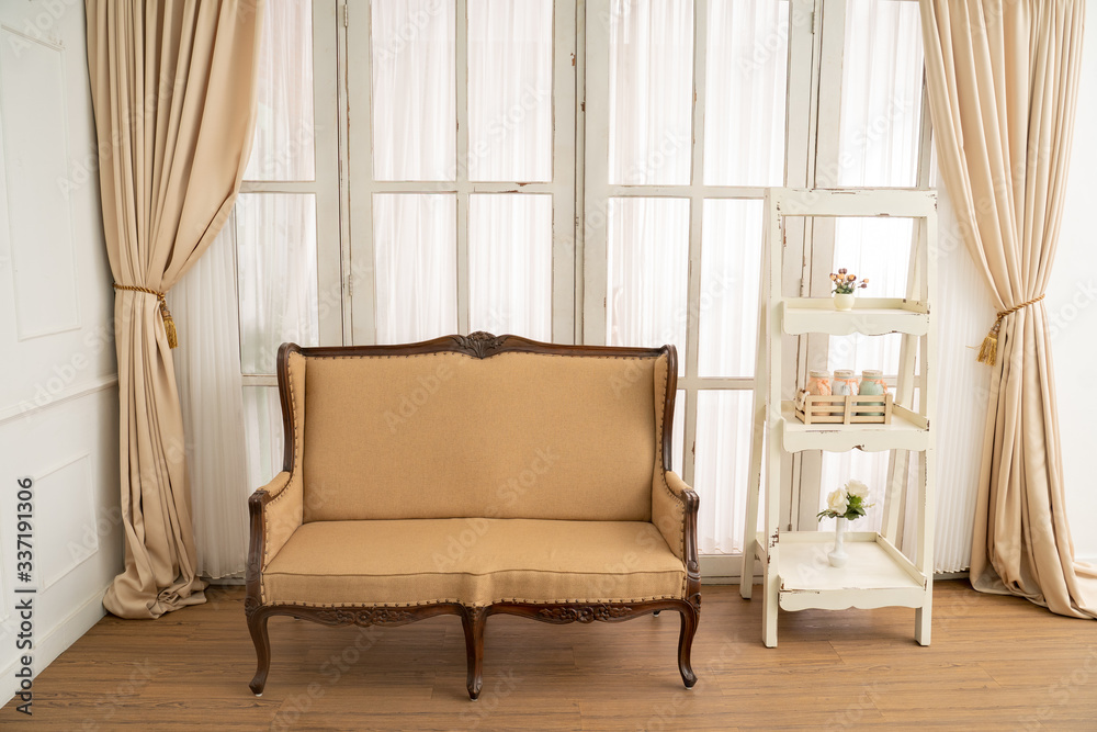 Classic wooden armchairs and simple stacking shelves with window background - obrazy, fototapety, plakaty 