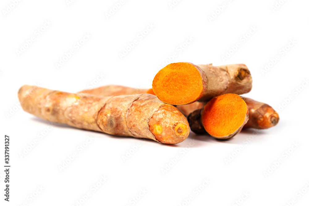 Close up of cutting of turmeric roots on white background, Herbs Close up of cutting of turmeric roots on white background, Herbs