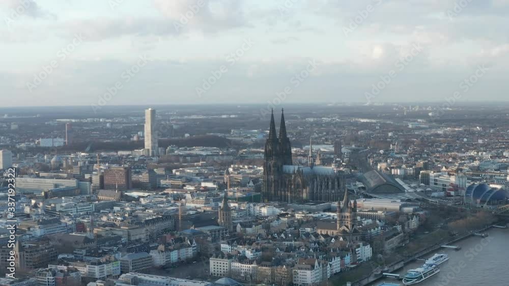 AERIAL: Wide Shot of Cologne Germany from the air with majestic Cathedral on sunny day AERIAL: Wide Shot of Cologne Germany from the air with majestic Cathedral on sunny day