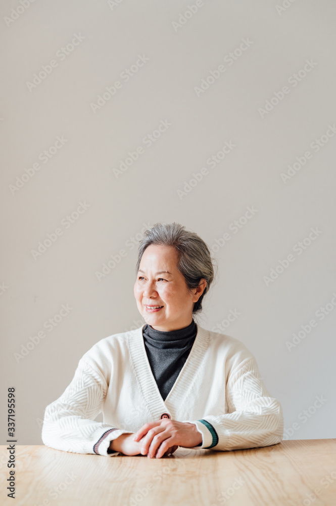 Fototapeta premium Portrait of older woman in Asia