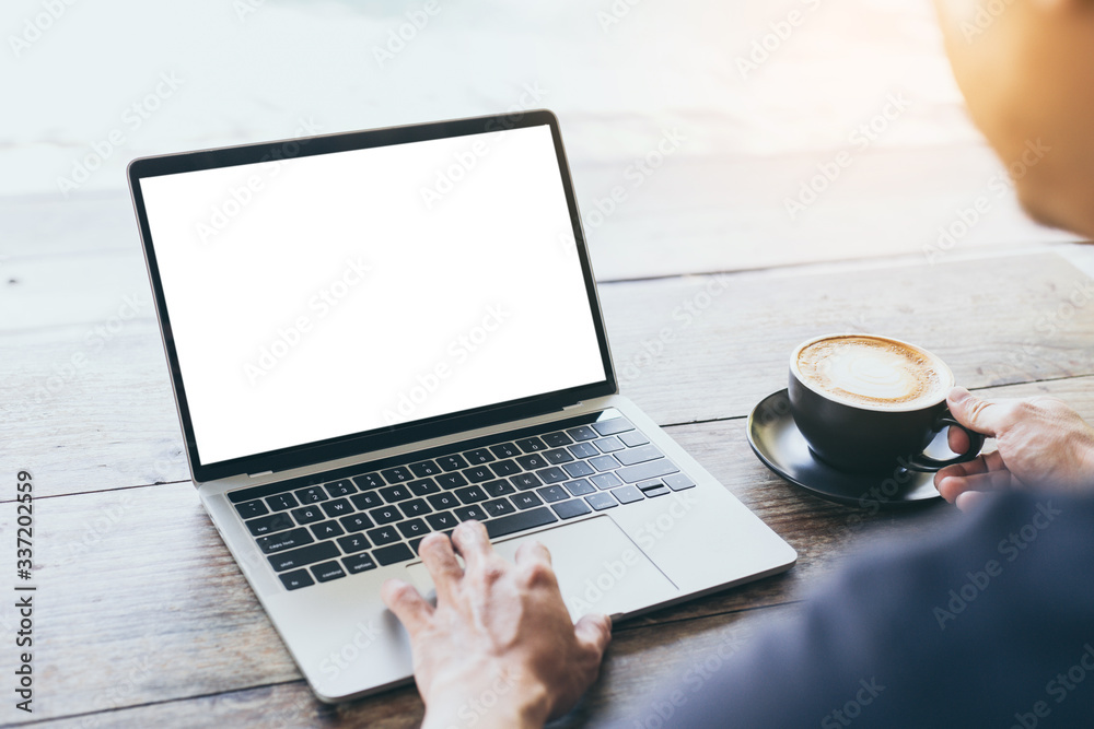 computer mockup image blank screen with white background for advertising text,hand woman using laptop contact business search information on desk at coffee shop.marketing and creative design computer mockup image blank screen with white background for advertising text,hand woman using laptop contact business search information on desk at coffee shop.marketing and creative design